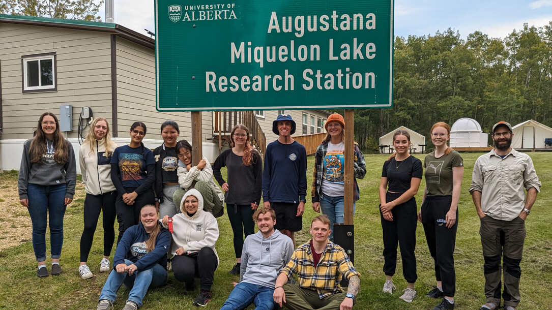 Students in front of the Research Station sign at Miquelon Lake.