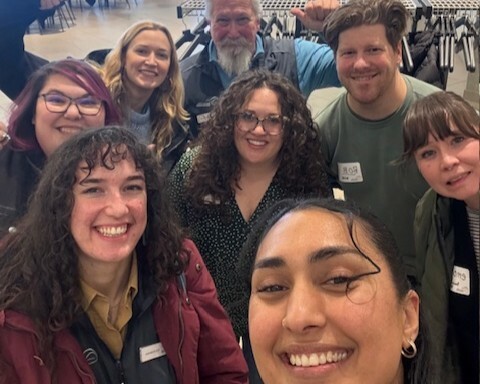 Niabi (bottom right) with (left to right) Erin, Pamela, Zoe, Brian, Milena, Bob and Emory at the Youth Forum