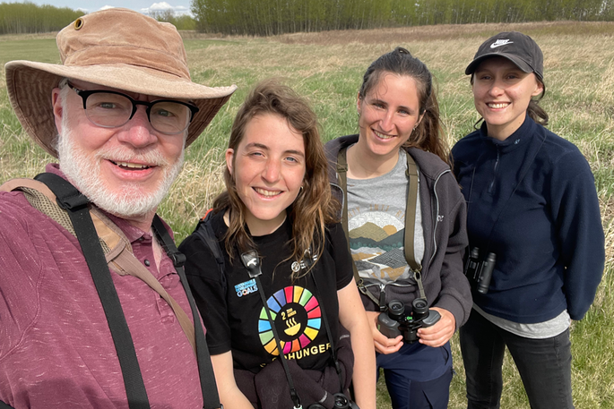 French students Louise Barbeau, Lena Collet and Lucile Pottier pictured with John Acorn.